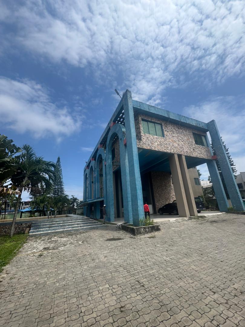 A commercial building on four (4) floors comprising various accommodation